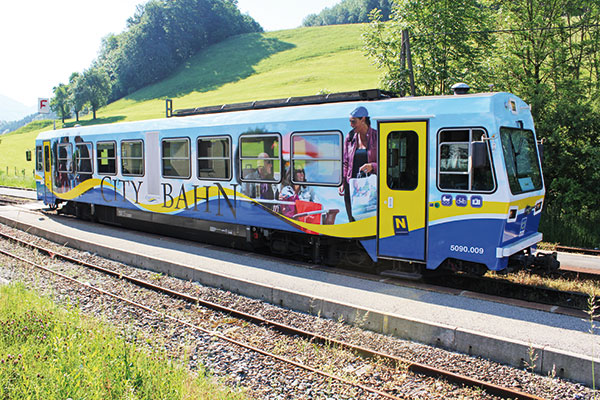 City Train of Waidhofen with attention-getting train signage